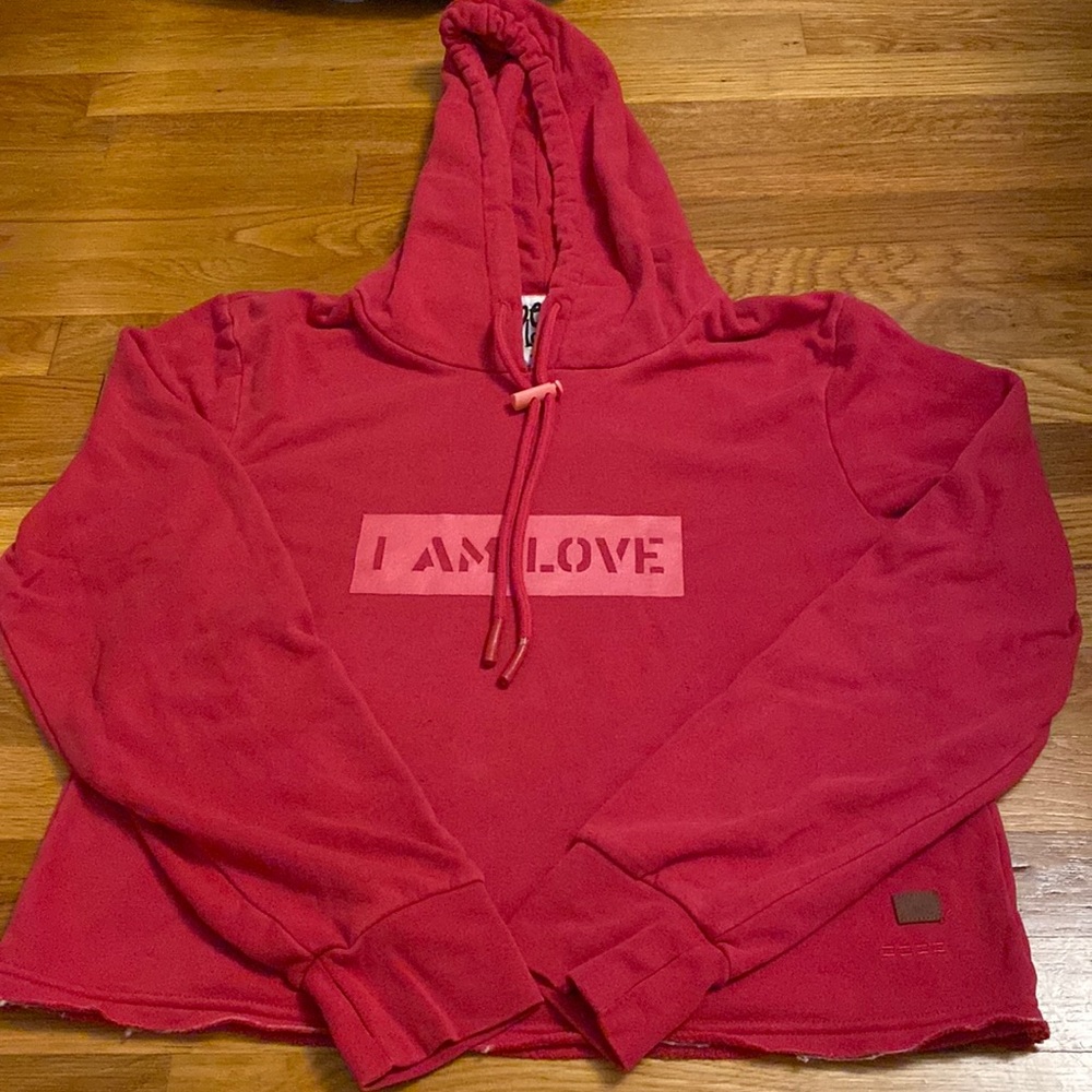 ‘I AM LOVE’ red hoodie